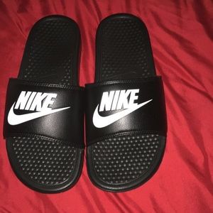Black and white nike slides